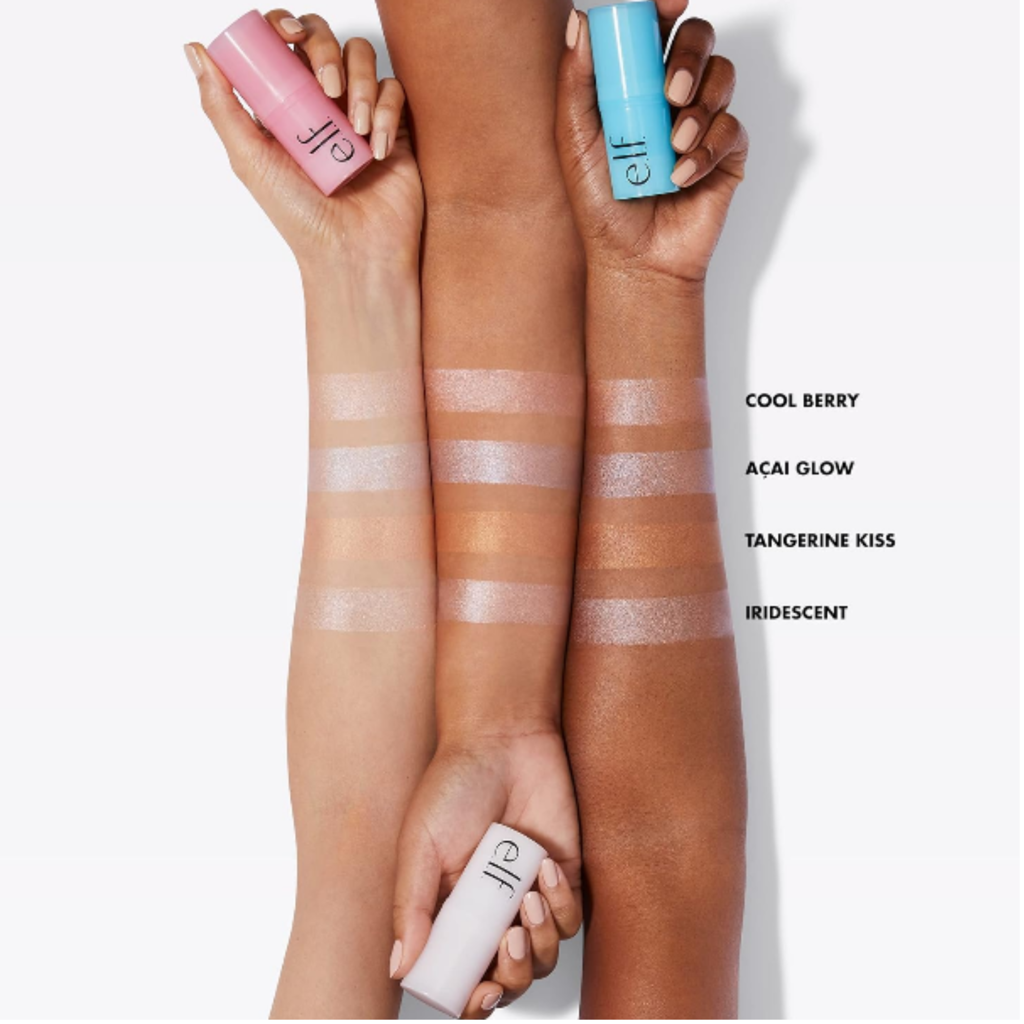 Hands holding shades of the daily dew stick with color swatches on arms against a white background
