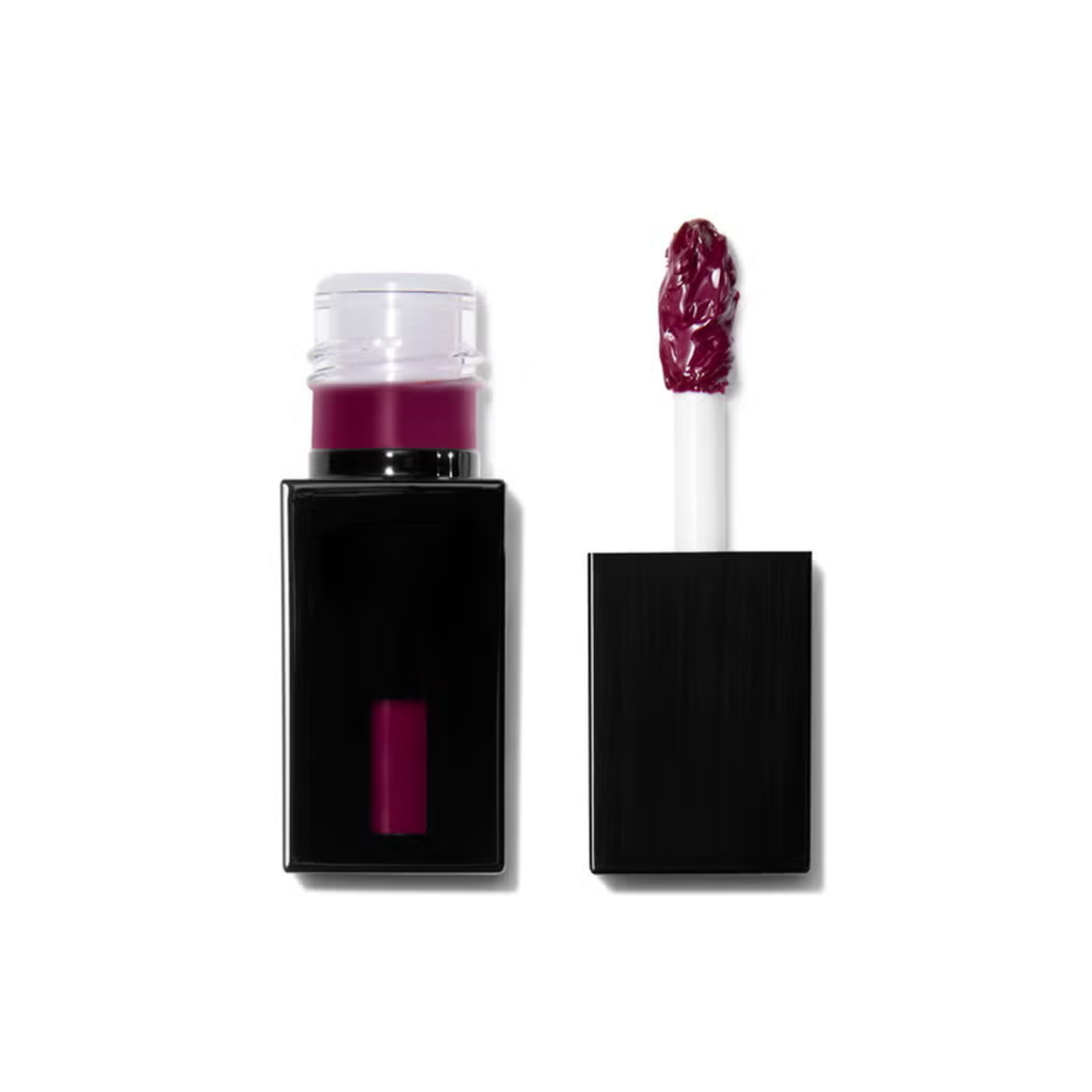 Lip tint with applicator on a white background