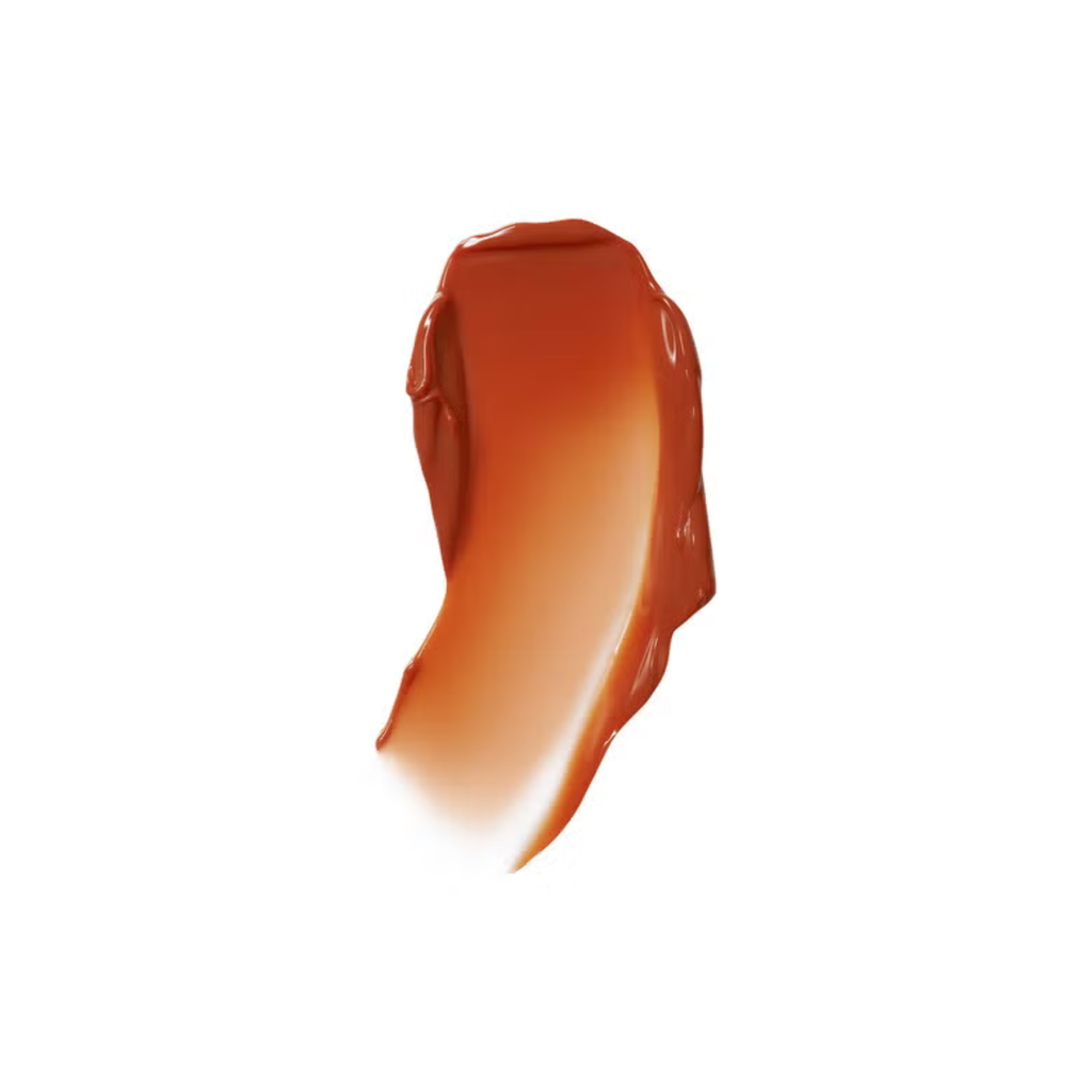 Coral cutie lip stain swatch on a white background