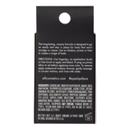 Back of a cosmetic product packaging with text and branding information.
