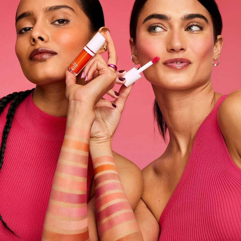 Two women applying elf blush products with a pink background and color swatches.