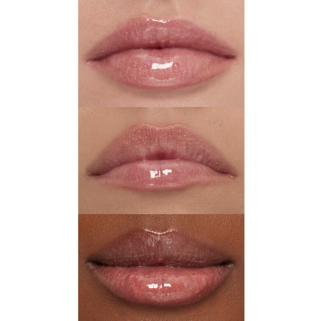 Close-up of pink lip gloss on three different lips with a white background.
