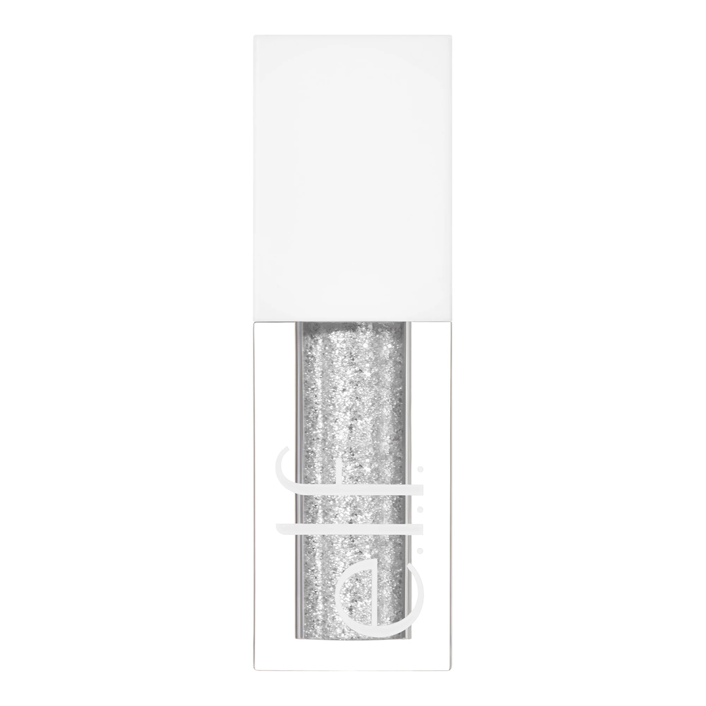 Silver glittery eyeshadow product in a clear container with a white background