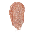 Rose gold glittery swatch of eyeshadow on a white background