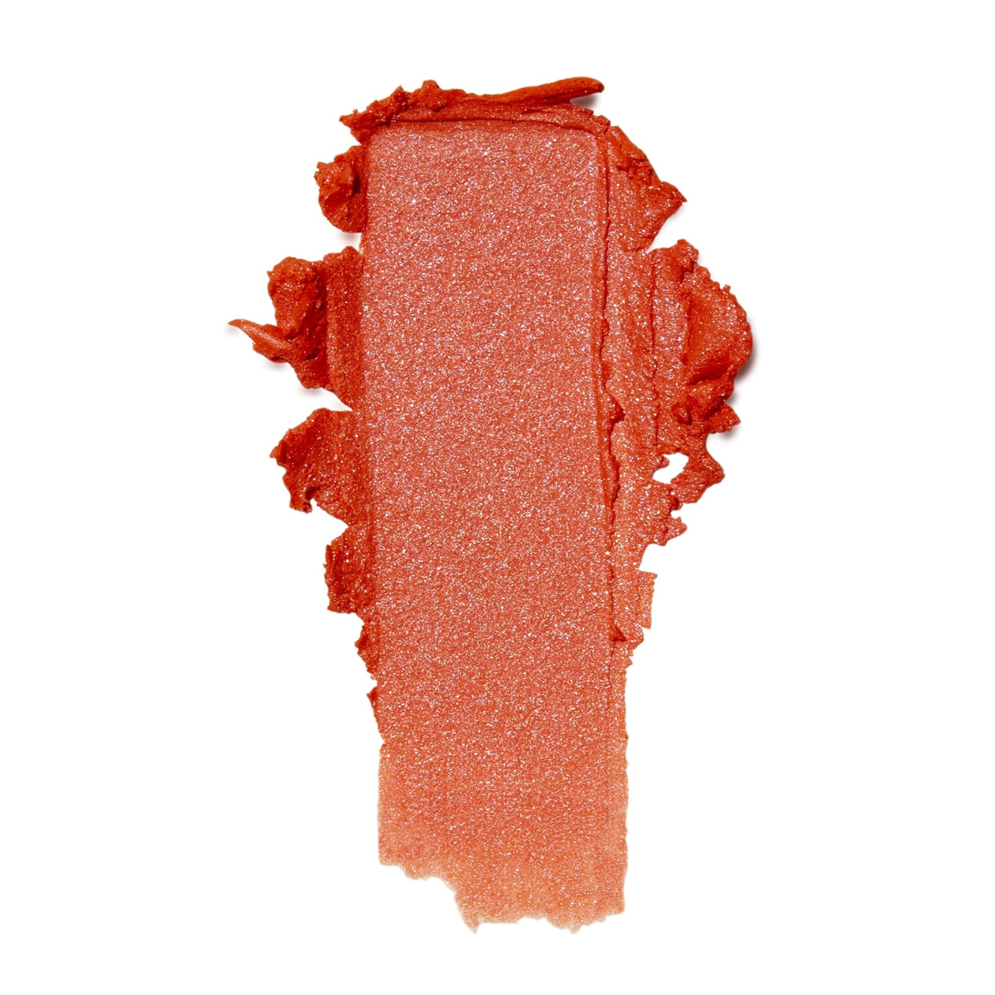 Swatch of red-orange putty blush on a white background