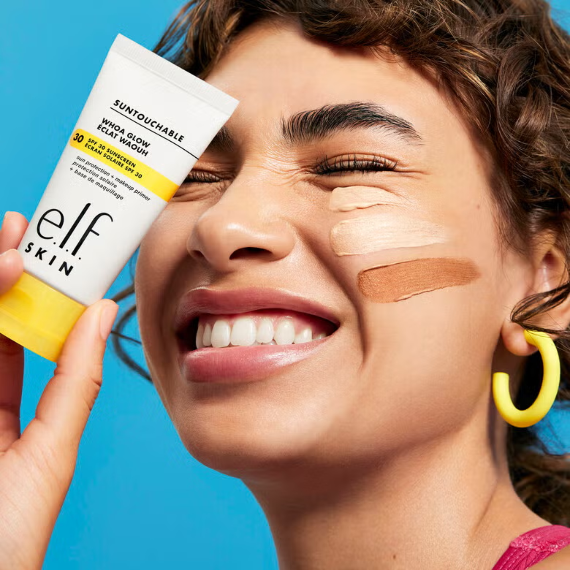 Model met stralende huid dankzij e.l.f. Suntouchable! Whoa Glow SPF 30.