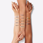 Three arms with different skin tones holding makeup products, showing color swatches.