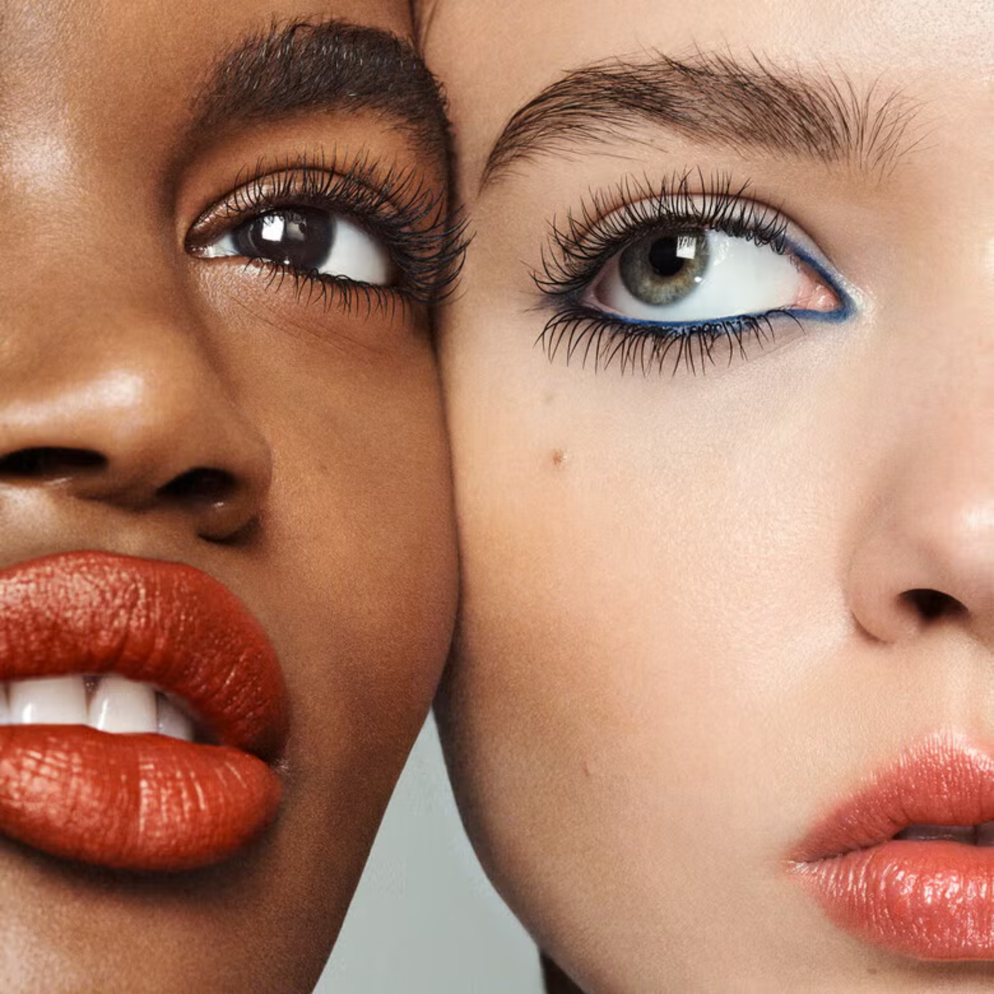 Close-up of two faces with different skin tones and eye colors wearing the same lash it loud mascara