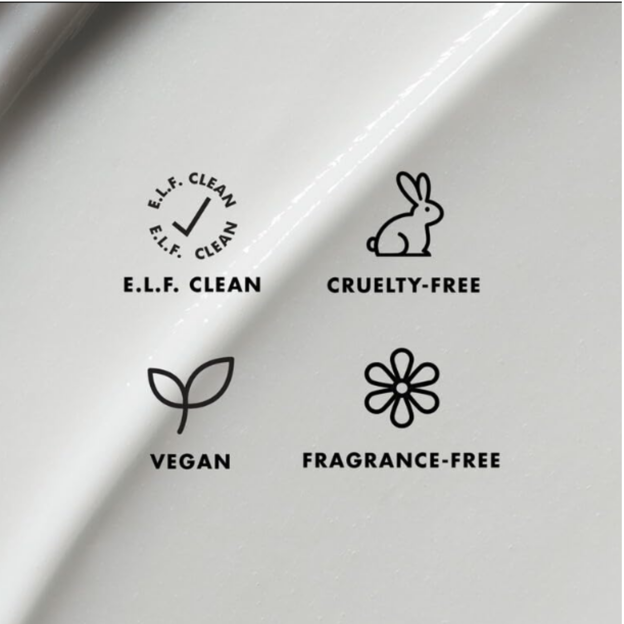 Icons for E.L.F. Clean, Cruelty-Free, Vegan, and Fragrance-Free on a white background