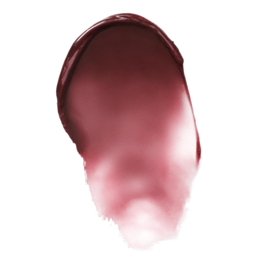 Close-up of a swatch of pink lipstick on a white background